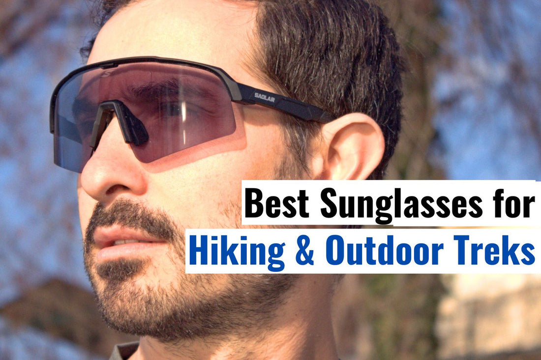 Man wearing SAOLAR photochromic hiking sunglasses, best eyewear for outdoor treks, UV400 protection, lightweight wraparound design for trekking.