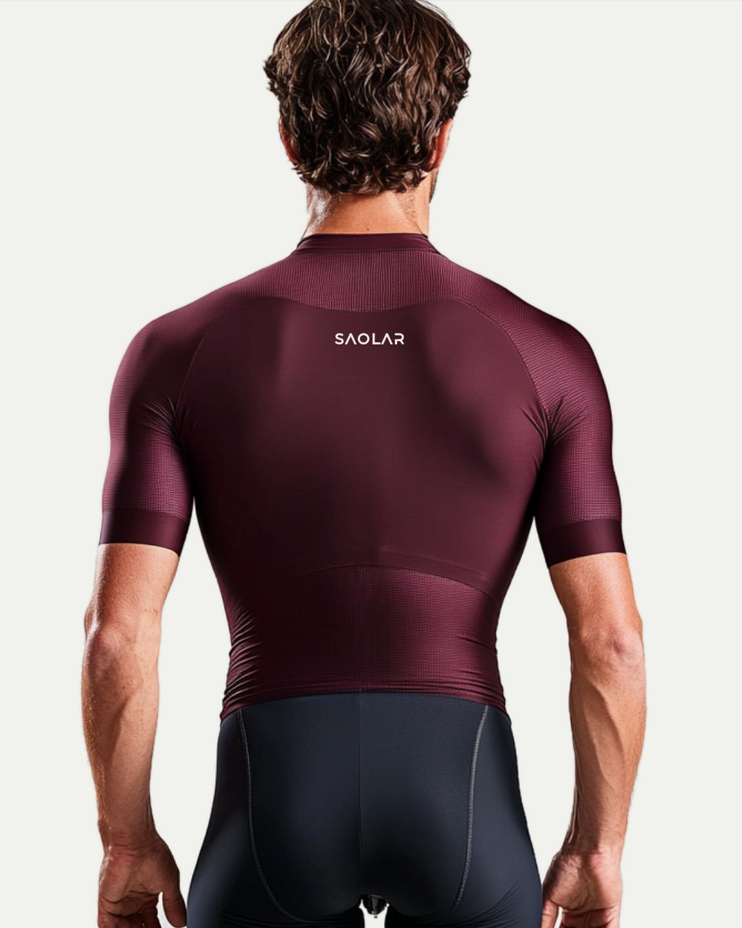 SAOLAR performance cycling jersey in deep burgundy, modern minimalist style.