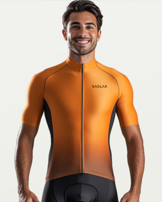 Cyclist wearing SAOLAR vibrant orange cycling jersey with race fit.