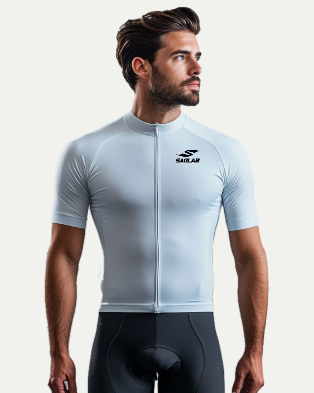 Male cyclist wearing SAOLAR sky-blue minimalist cycling jersey, sleek design.
