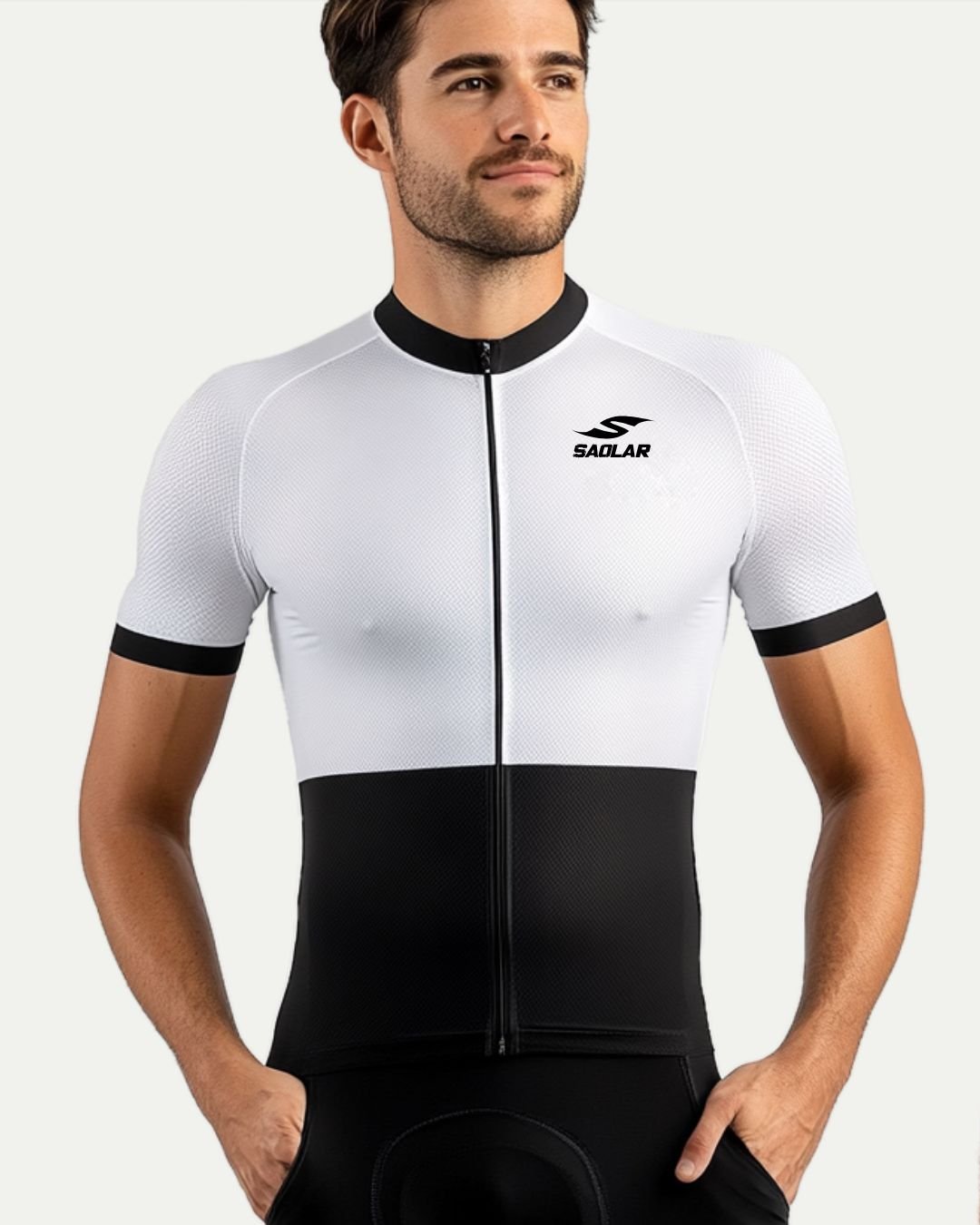 Cyclist wearing SAOLAR black-and-white cycling jersey, sleek modern design.