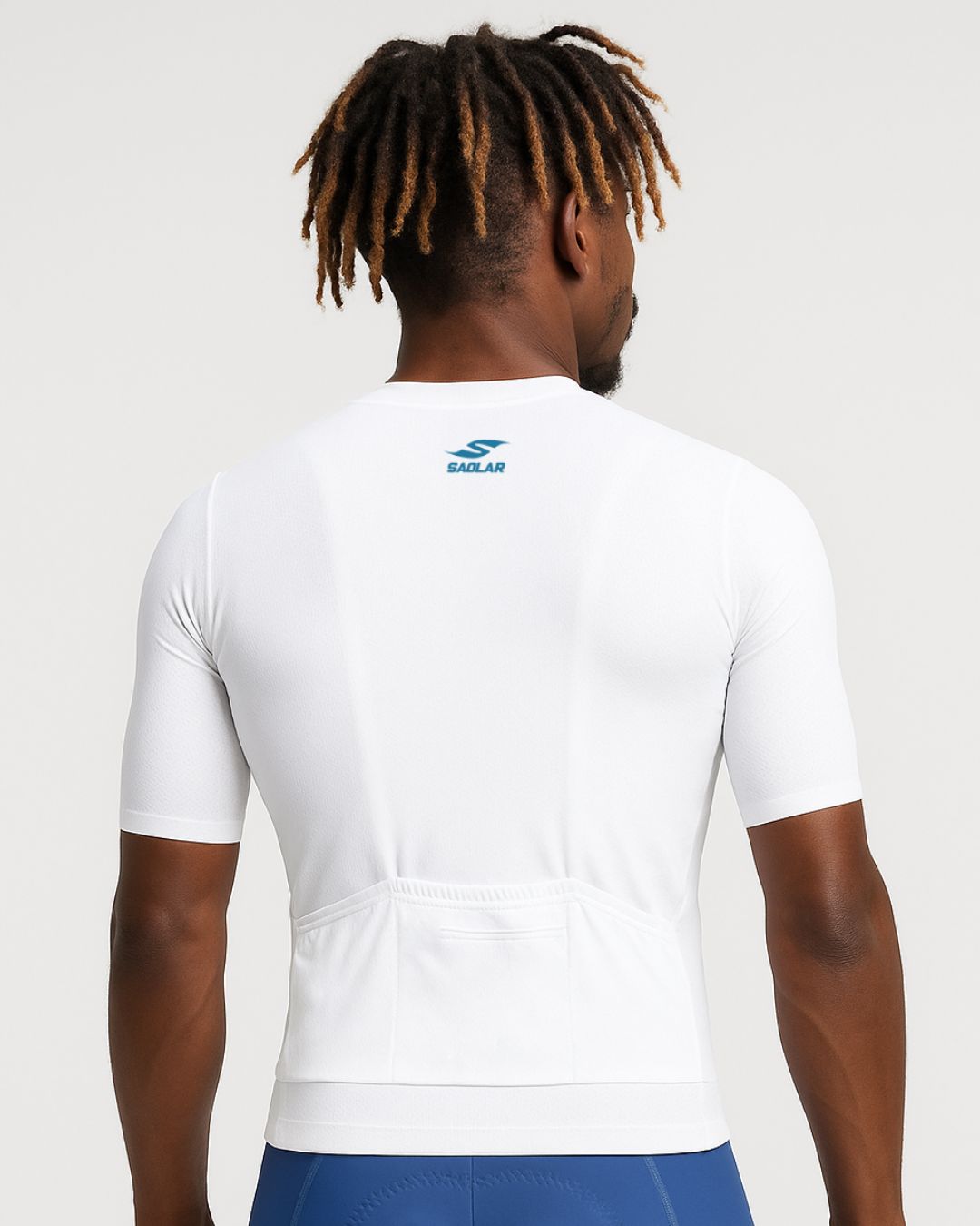 Back view of the SAOLAR S3 Drift white cycling jersey with subtle blue accents and rear pockets for storage.