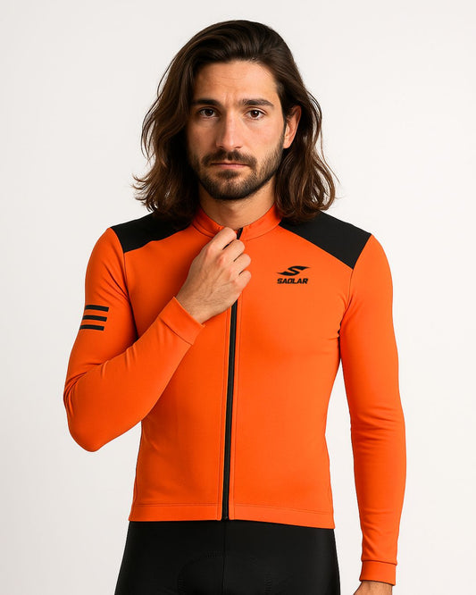 Front view of the SAOLAR S2 Granite orange cycling jersey with black shoulder accents and long sleeves.