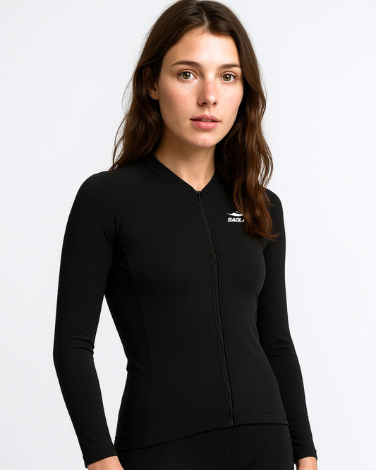 Woman wearing SAOLAR S5R Petal black long-sleeve cycling jersey, showcasing aerodynamic fit and modern performance design.