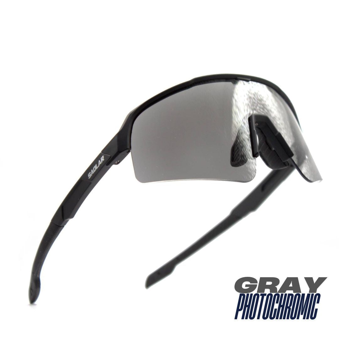 Isometric view: SAOLAR Stratos sport sunglasses with gray photochromic lenses, semi-rimless wraparound aerodynamic design.