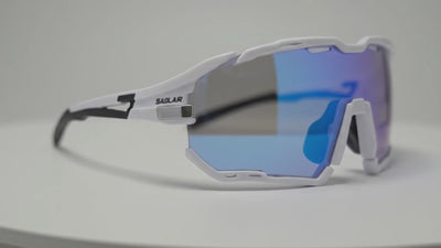 SAOLAR Rapture ICE sports sunglasses featuring blue REVO mirrored lenses, ventilation holes, and rubberized temple tips against white studio background.