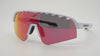 SAOLAR Stratos Kingsnake sunglasses featuring bold white temples, striking red photochromic mirrored lenses, futuristic styling, ventilation holes, and prescription compatibility.